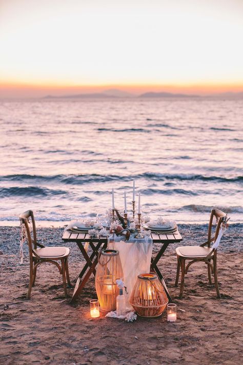 This sunset wedding dinner set at a private beach of the Athenian Riviera is an ode to the laid back luxury and summer vibes | Athens Wedding Planner & Designer: @mitheoevents Photo: @pahountisg Venue: Kavouri private beach | #mitheoevents #weddingplannergreece #destinationweddingplanner #athenswedding #elopement #beachwedding #intimatewedding #seathemewedding #weddingdinner #weddingstyling #weddingdecor #romanticdinner #beachdinner #tablesetting #beachdecor #sunsetdinner #tablescape Romantic Dinner At Beach, Private Wedding Dinner For Two, Private Beach Dinner, Beach Dinner Ideas Romantic, Romantic Beach Picnic Couple, Private Dinner For Two Romantic, Beach Romantic Dinner, Beach Set Up, Table For Two Romantic