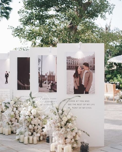 Sweetbella Decoration on Instagram: "I look at you and see the rest of my life in front of my eyes 👀🤍 .. .. Venue @jumeirahbali WO @rivieraeventorganizer Photo @iluminen MC @arnoldwarm @pandasuper .. .. #bali #balievent #baliwedding #baliweddingdestination #baliweddingdecor #baliweddingdecoration #baliweddingstylist #weddingbali #weddinginbali #thebalibride #weddinginspiration #flowers #floristbali #thebridestory #weddingideas #flowerbouquets #cliffweddingbali #dreamwedding #photogallery #welcomesignage" Photo Wedding Decorations, Wedding Signage With Photo, Wedding Decor Photo Display, Wedding Entrance Pictures, Wedding Entrance Photo Display, Wedding Photo Entrance, Photo Wedding Decor, Wedding Venue Entrance Decor, Photo Decoration Ideas