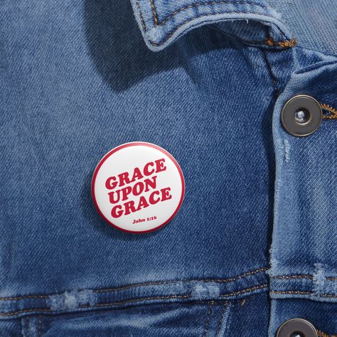 Title: "Grace Upon Grace Christian Enamel Pin - Inspirational Religious Badge" Inspired from John 1:16 Description: Embrace the profound message of grace with our exquisite "Grace Upon Grace" Christian enamel pin. This beautifully crafted badge serves as a constant reminder of the boundless grace that surrounds us every day. Featuring elegant script lettering intertwined with delicate accents, this pin exudes timeless charm and adds a touch of spirituality to your attire or accessories. Wear it on your lapel, tote bag, backpack, or hat - wherever you choose, let it be a conversation starter and a symbol of your unwavering faith. Product Details: Whether you're expressing your devotion, seeking inspiration, or sharing a meaningful gift with a loved one, this "Grace Upon Grace" Christian ena Christian Button Pins, John 1 16, Grace Upon Grace, Grace Christian, Christian Pins, Script Lettering, Button Pins, Safety Pin, Custom Pins