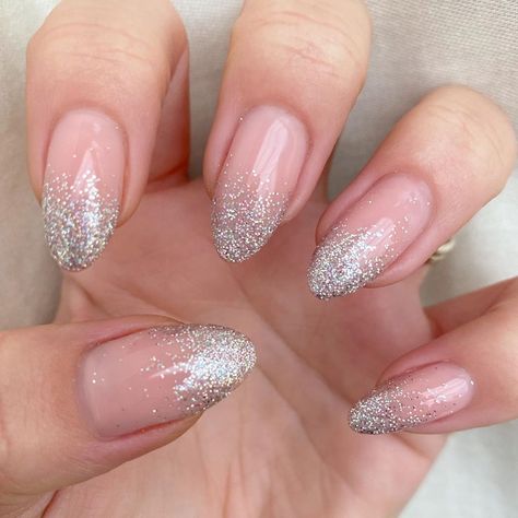 Silver Glitter Gradient Nails, Oval Glitter Ombre Nails, Natural French Tip Nails With Glitter, Silver Acrylic Nails Almond Shape, Silver Fade Nails, Silver Glitter Fade Nails, Glitter Nails Ombre Sparkle, Silver Glitter Ombre Nails Almond, Clear Nails With Silver Glitter