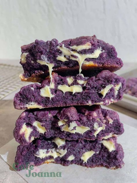 These ube cookies boast a chewy, gooey center with pockets of white chocolate and a crispy outer layer, with a unique Filipino twist of ube flavor. Ube Oreo Cookies, Ube White Chocolate Chip Cookie, Ube Cookie Recipe, Ube Crinkles Cookies Recipe, Ube Cookies, Ube Dessert Recipe, Ube Dessert, Ube Extract, Biko Recipe