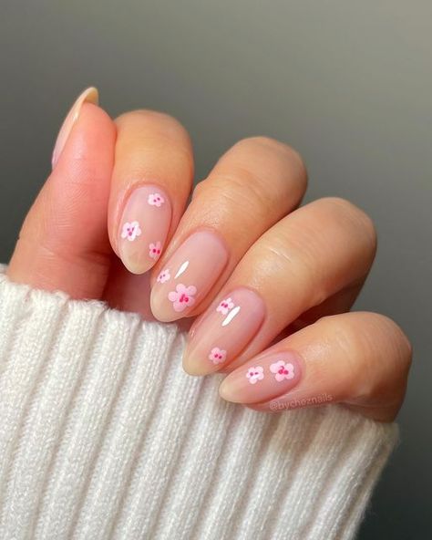 emily zheng • chez nails on Instagram: "cherry blossom nails 🌸🌸🌸 swipe for the tutorial & comment “links” to have product details sent to your DM’s! 

this nude base is stunning, it’s a new release from Cirque. I love that it’s not too pink and not too sheer. might be my new go-to 🤭

products used • pr 
💅🏼 @cirquecolors Odette, one coat over a ridge filler base coat • BYCHEZ10 to save
🌸 @ilnp Twirl
💖 @ilnp Cupid
🖌️ @twinkled_t dotting tool

ib @nailsbytaylorjustine 

#cherryblossomnails #flowernails #floralnails #springnails #springnailart #pinknails #pinknailart #cirquecolors #ilnp #twinkledt #nailtutorial #nailarttutorial spring nail inspo, flower nail art, floral nails, elegant nail art, easy nail tutorials, pink nail art, almond nails" Cherry Blossom Nails Art, Cherry Blossom Nails, Milky Pink, Milky Nails, Floral Nail Designs, Cute Spring Nails, Pink Nail Art, Almond Nails Designs, Cute Summer Nails