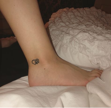 #ankle #ankletattoo #tattoo #cat #heart #paw #pawprint #smalltattoo #tat Paw Print Tattoo On Ankle, Paw Print Tattoo Ankle, Cat Paw Print Tattoo, Heart Tattoo Ankle, Paw Print Tattoos, Cat And Dog Tattoo, Symbol For Family Tattoo, Small Animal Tattoos, Pain Chart