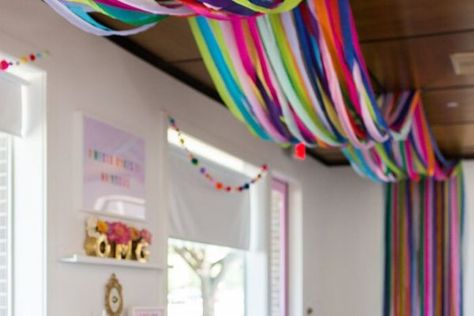 Hanging Crepe Paper Streamers, Rainbow Streamers Ceiling, How To Twirl Streamers, Streamer Decorating Ideas, Rainbow Streamers Decorations, Decorating With Paper Streamers, Crepe Paper Streamers Decorations, Crepe Paper Wall Backdrop, Birthday Streamer Ideas Ceilings