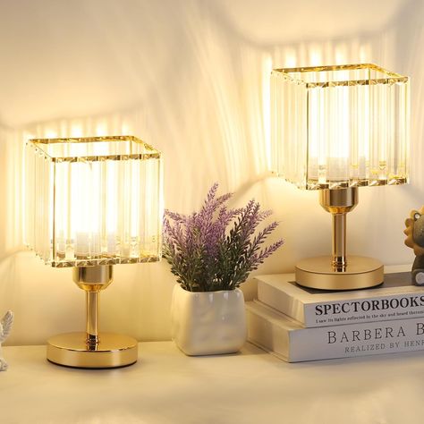 About this item 【Decorative Crystal Lamps】Uniquely designed sparkling crystal table lamps that give off a beautiful soft light and sparkle throughout the room. Dual gold bedside lamps are a perfect decoration for children's rooms, guest rooms, bedrooms, nightstands or living rooms. 【Dual Table Lamps for Bedside】The 1.7-meter-long power cord can place the table lamps gold set of 2 anywhere far or near the bed, and there is no need to fumble for the switch on the base of the nightstand light with crystal shade in the dark, because the switch of this bedside lamp is on the power cord, and you can place it at the bedside within reach. Crystal Bedroom, Small Desk Lamp, Table Lamps Living Room, Bedroom Bedside Lamp, Crystal Table, Gold Lamp, Crystal Table Lamps, Nightstand Lamp, Iron Lighting