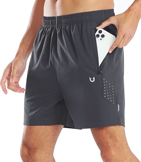 90% Polyester, 10% Spandex

Zipper Pockets: The 2 Side pockets and 1 back pocket with zipper offer easy storage for your essentials

Soft Elastic waistband/ built-in adjustable drawstring for custom fit Mens Trouser, Functional Workout, Golden Wolf, Half Pant, Amazon Clothing, Active Workout, Amazon Clothes, Boys Shorts, Mens Running