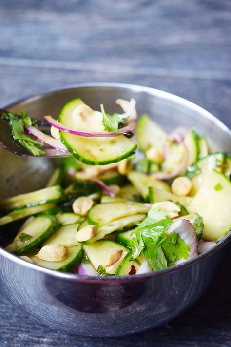 This Thai cucumber salad is a refreshing side dish, topped with crunchy peanuts for a delicious, crunchy, texture. Thai Cucumber Salad Recipe, Thai Restaurant Menu, Cucumber Salad Dressing, Thai Cucumber, Thai Cucumber Salad, Cucumber Salad Recipe, Cucumbers And Onions, Cucumber Sandwiches, Persian Cucumber