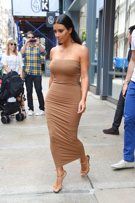 Kim's tan glows against this tanned-hued spandex dress.   - MarieClaire.com Nude Outfit, Kim Kardashian Wedding, Fall Color Trend, Kardashian Makeup, Kim Kardashian Makeup, Kim Kardashian Hair, Gala Gowns, Nude Outfits, Kim Kardashian Outfits