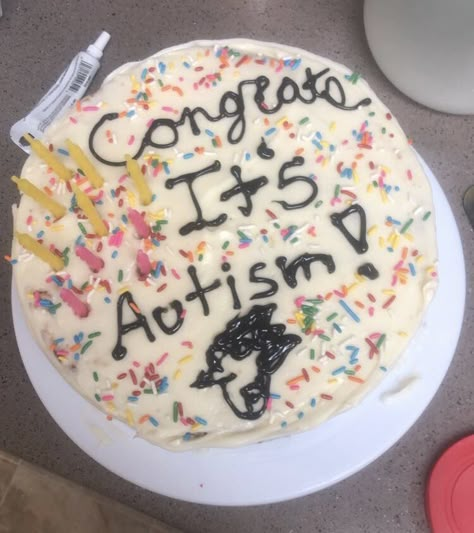 A messily frosted cake with rainbow sprinkles that states “congrats it’s autism” followed by a (poorly drawn in icing) picture of spamton from deltarune Quirky Cake Ideas, Funny Promotion Cake, Sassy Cake Ideas, First Period Cake, Silly Cake Ideas, Coming Out Cake, Here Me Out Cake, Funny Birthday Cakes For Adults, D20 Cake