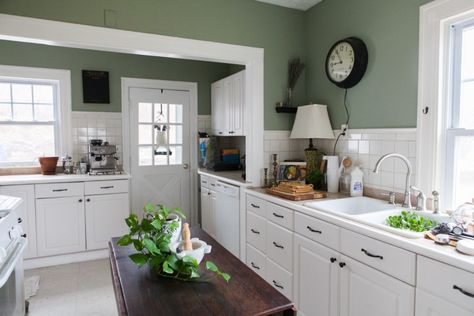 The Best Dark Green Kitchens Like Ever » Jessica Brigham Accent Wall White, White Cottage Kitchen, Green Accent Wall, Green Kitchen Walls, Green Kitchens, Dark Green Kitchen, Cream Cabinets, White Wainscoting, Dark Green Walls