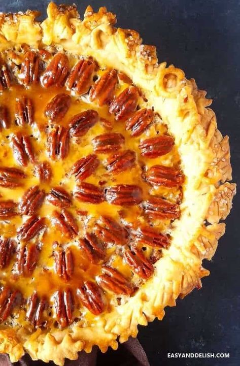 Easy Texas Pecan Pie Recipe has a nutty and sweet ooey gooey filling with a crunch that indulges any palate. It's made with light corn syrup/brown sugar and perfect dessert for Fall and Thanksgiving! #pecanpie #easyrecipe #pie #thanskgiving #dessertrecipes Texas Pecan Pie Recipe, Texas Pecan Pie, Best Pie Crust Recipe, Dessert For Fall, Pecan Pie Cake, Pecan Pie Cookies, Best Pecan Pie, Pecan Pie Easy, Pecan Pie Filling