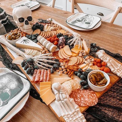 How to make skeleton themed charcuterie boards for Halloween. Halloween Party Serving Ideas, Halloween Catering Display, Halloweenchacutery Board Ideas, Charcuterie Skelton, Large Halloween Charcuterie Board, Halloween Themed 60th Birthday, Halloween Party Food Table Display, Fall Halloween Charcuterie Board, Halloween Chauctier Board Ideas