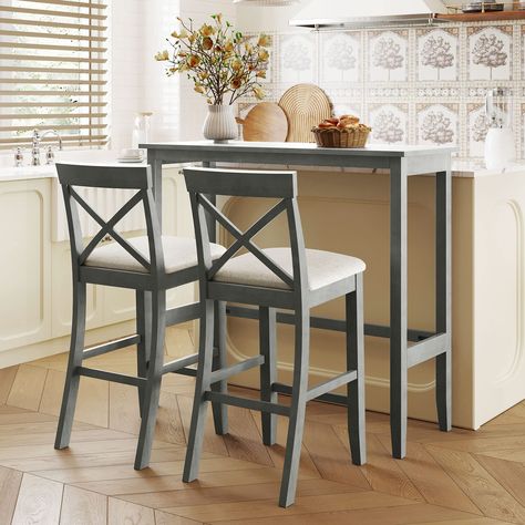 PRICES MAY VARY. 🌈[3-Piece Dining Table Set] - Featuring an understated silhouette with clean lines, this farmhouse dining table set brings simple and clear flair to your home. Come with 2 bar chairs and 1 bar height table, both chairs can be tucked underneath the table for space-saving while provides place for daily breakfast. 🌈[Multifunctional Bar Set] - As a long bar pub table, it is superb for a dining table, a kitchen island or a mini bar with its ideal bar height. It can also be used a c Breakfast Nook Set, Farmhouse Dining Table Set, Counter Height Dining Table Set, Bar Height Dining Table, Bar Table Sets, Counter Height Dining Table, Kitchen Dining Sets, Kitchen Table Settings, Farmhouse Dining Table