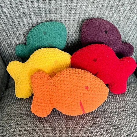 Colorful Fish Crackers Crochet Pattern by Cuddle Roo Shop - Here is a super cute and beginner-friendly Colorful Fish Cracker crochet pattern from Cuddle Roo Shop! These adorable little crochet fish will add a splash of fun to any decor! (paid pattern) Goldfish Cracker Crochet Pattern, Crochet Goldfish Cracker, Crochet Goldfish Cracker Pillow Pattern Free, Fun Crochet Pillow Patterns, Crochet Gifts For Kids Free Pattern, Crochet Goldfish Pattern Free, Crochet Fish Pillow, Crochet Toys For Kids, Crochet Fish Pattern Free