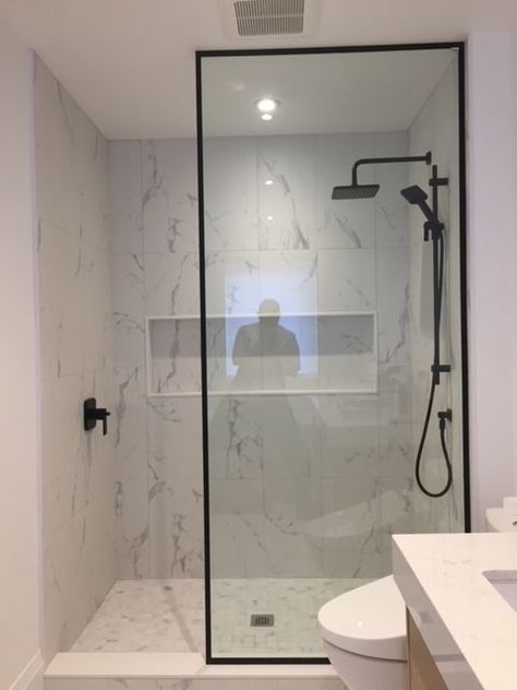 Single Shower Panel, Contemporary Shower Design, Condo Shower Ideas, Shower Glass With Black Frame, Black Shower Doors Frame, Black Framed Shower Glass Panel, Single Glass Panel Shower Door, Glass Shower With Black Frame, Black Framed Shower Enclosure