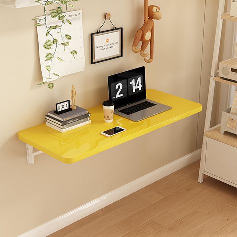 PRICES MAY VARY. 【Space Saving & Foldable】: The wall mounted folding table brackets is foldable design, simply press the release arm to 90 degrees collapse the table. Compared with traditional desks, this desk can greatly save floor space and turn your wall into an efficient work area 【Sturdy Design】: The floating wall desk adopting a 0.7“ thick density board,built in solid steel brackets provide exceptional support, allowing the table to hold weights of up to 110 lbs. providing you with a firm, Desk Ideas For Small Spaces, Floating Desk Ideas, Floating Wall Desk, Mounted Folding Table, Wall Mounted Folding Table, Folding Computer Desk, Desk For Home Office, Small Office Desk, Cheap Desk