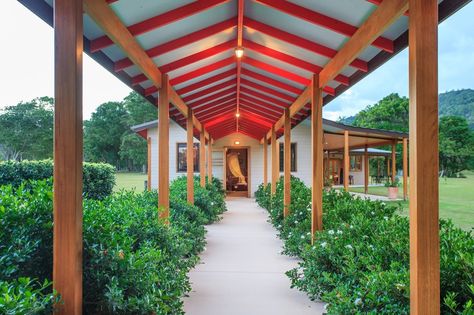 A covered walkway connects the main home to the barns. Covered Walkway Architecture, Covered Walkways, Renovated Farmhouse, Wood Walkway, Indoor Pool Design, Backyard Walkway, Walkway Design, Outdoor Walkway, Covered Walkway