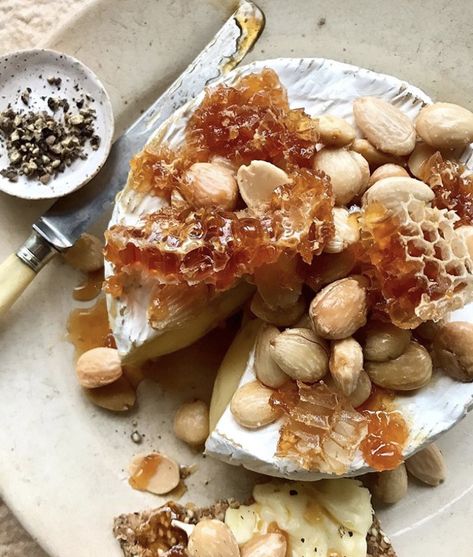 Cheese is good. According to @melinahammer, warm, gooey, rich cheese topped w/ sweet honeycomb & salty Marcona almonds is even better! Indulge w/ this next level Baked Brie, you deserve it!⁠  .  .  #feedfeed #brie #bakedbrie #cheese #honey #honeycomb #almonds #salty #sweet #appetizer #cheeseplate Honeycomb Recipe, Cheese Party, Charcuterie Recipes, Cheese Topping, Baked Brie, Cracked Pepper, Plastic Wrap, Food 52, Brie