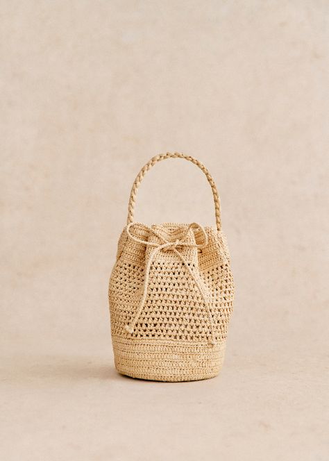 Worn on the shoulder and in the hand;Hand-woven raffia;Made in our Madagascan workshop;Raffia exterior;Unlined;Length of handle: 56 / 11 cm / 22 / 4.3 in;Two non-adjustable raffia handles;Closed by knotting;Dimensions: 22 x 14.5 x 22 cm / 8.6 x 5.5 x 6.6 in Best Gift Cards, Basket Design, Woven Raffia, Basket Bag, Vegetable Tanned Leather, Free Bag, Parisian Style, Embroidered Flowers, Crochet Bag