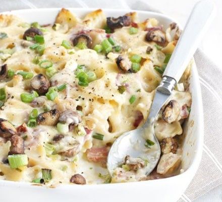 Creamy ham & mushroom pasta bake recipe - BBC Good Food Ham And Mushroom Pasta, Mushroom Pasta Bake, Family Supper, Baked Pasta Recipes, Leftover Ham, Mushroom Pasta, Bbc Good Food Recipes, Rigatoni, Pasta Bake