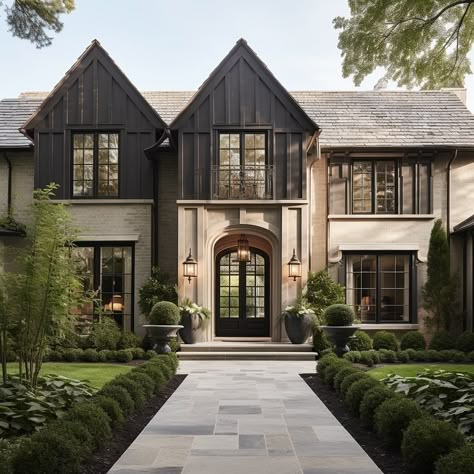 Stone, wood, or combination for the front facade? We generally favor “less is more” when it comes to different exterior materials, but… | Instagram Tudor Modern House, Tudor Home Exterior, Brick And Stone Exterior Combinations, Modern Tudor House Exterior, Moody Traditional, Stone House Exterior, Tudor House Exterior, Modern Brick House, Farmhouse Style Exterior