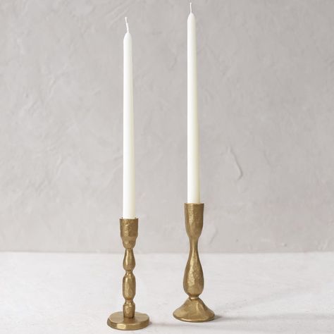 PRICES MAY VARY. Timeless Elegance: Elevate your decor with these exquisitely handcrafted brass iron taper candle holders. Their abstract molded shapes and antique brass finish make for a striking statement piece that adds character and style to any room. Artisanal Craftsmanship: Crafted using traditional blacksmithing techniques, each candle holder showcases the organic beauty of forged iron. With slight variations in design, no two pieces are exactly alike, creating a unique and charming displ Gold Candlestick Holders, Elegant Candle Holders, Antiqued Candle Holders, Wrought Iron Candle Holders, Minimalist Wedding Decor, Gold Candle Sticks, Gold Candle Holders, Handcrafted Candles, Candle Sticks