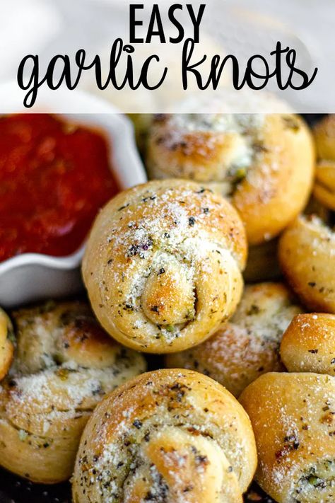 Easy garlic knots made from store bought pizza dough. Crunchy and flavorful on the outside, soft and fluffy on the inside, and ready in less than 30 minutes. via @frshaprilflours Store Bought Pizza Dough Recipes, Pizza Dough Garlic Knots, Biscuit Rolls Recipes, Easy Garlic Knots, Homemade Garlic Knots, Tuesday Dinner, Store Bought Pizza Dough, Garlic Knots Recipe, Seasoned Butter