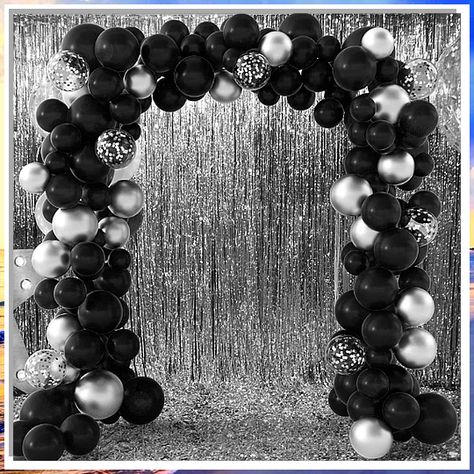 Looking for the perfect black wedding backdrop ideas to make your special day unforgettable? Check out these stunning and elegant designs that will add a touch of sophistication to your wedding decor. From classic black drapes to modern geometric patterns, these backdrops will surely wow your guests and create the perfect backdrop for your big day. Say "I do" in style with these gorgeous black wedding backdrop ideas. Balloon Arch Party Decor, Black And White Ball Sweet 16, Black Silver Quinceanera Theme, Black And Silver Anniversary Decorations, Silver And Black New Years Eve Party, Black And Silver Engagement Party, Black Balloon Arch Backdrop, Black And Silver Prom Backdrop, Silver Black White Party