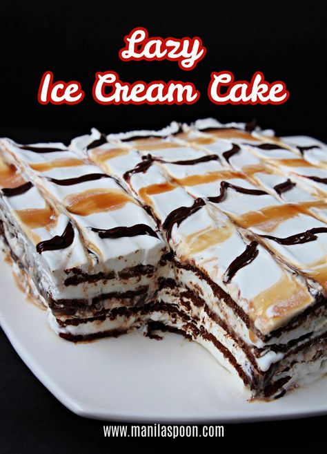 Layers of your favorite ice cream sandwich, whipped cream, chocolate fudge and caramel sauces and sprinkled with nuts (and some more sauce on top!) - this Lazy Ice Cream Sandwich Cake is summer's yummiest treat! Did I mention it is crazy EASY to make? Diy Ice Cream Sandwich Cake, Ice Cream Sandwich Cake With Oreos, Ice Cream Sandwich Dessert Cool Whip, Ice Cream Sandwiches Cake, Ice Cream Sandwich Cakes, Ice Cream Cake With Ice Cream Sandwiches, Ice Cream Cake Ideas, Caramel Sauces, Ice Cream Sandwich Cake Recipe