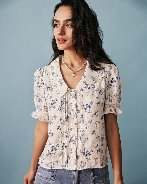 Details: - Model is 5 8½, wearing a Size S Model's measurements: Bust - 31.9'', Waist - 24'', Hips - 35.4'' - Lace spliced - Pleats - Regular fitting - V neck - Floral print Fabric: This shirt is made of Polyester, a man-made fiber that is soft, lustrous, and dries fast. It's also durable, with its good resistance to wrinkles, stains, and sunlight. Description: You are a sweetie. Fashioned with a lace-spliced design, this shirt is printed with flowers to exude your romantic vibe and give you a s Tailored Clothes, Lace Splicing, Pretty Blouses, Floral Print Fabric, Blouse Short Sleeve, Floral Print Shirt, Fashion Design Clothes, Floral Print Shorts, Sleek Look