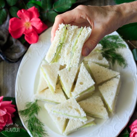 Easy Cucumber Sandwiches: an dainty appetizer to serve at an English tea party, Easter brunch, or bridal shower. Thinly sliced cucumbers, cream cheese, and fresh dill fill these fancy triangle sandwiches to make the perfect finger food at your next ladies’ party. | www.savortheflavour.com #teaparty #easter #brunch #bridalshower #cucumber Triangle Sandwiches, Easy Cucumber Sandwiches, Bridal Shower Appetizers, Bridal Brunch Food, Cucumber Sandwiches Recipes, Shower Appetizers, Fingerfood Baby, Sandwich Cream, Tea Party Sandwiches