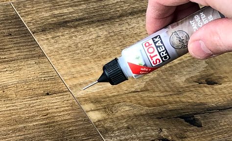 Person using lubricant on a floor. Fix Squeaky Floors, Creaky Floors, Squeaky Floors, Parts Of Stairs, Interior Staircase, Wooden Floorboards, Wood Putty, Drywall Screws, Wooden Stairs