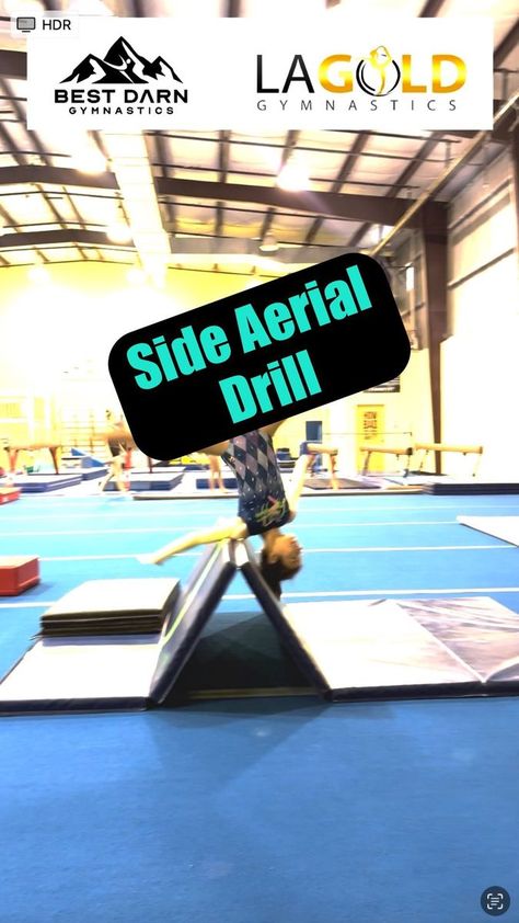 Super cool take on a side aerial drill! The athlete uses the panel mat as a marker to rise over, a slight support for the shoulder to focus on correct pathways, and it encourages head in on the finish prior to stand up. We hope this helps you and your athletes create their Best Darn Gymnastics! #gymnastics #coaching #education | Best Darn Gymnastics | Aerial Drills Gymnastics, Side Aerial Drills, Side Aerial, Cheer Tumbling, Gymnastics Drills, Gymnastics Coaching, Drills, Tumbling, Super Cool