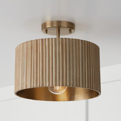 Our Chavis pendant offers a high level of customizability; it comes with the ability to hang from the ceiling as a semi-flush mount or from a chain at an adjustable height to suit any space. Its wooden shade displays a corrugated surface to add a pleasing texture. Wooden Shades, Brass Interior, Entryway Lighting, Foyer Lighting, Capital Lighting, Modern Hallway, Semi Flush Lighting, Semi Flush Ceiling Lights, Hallway Lighting