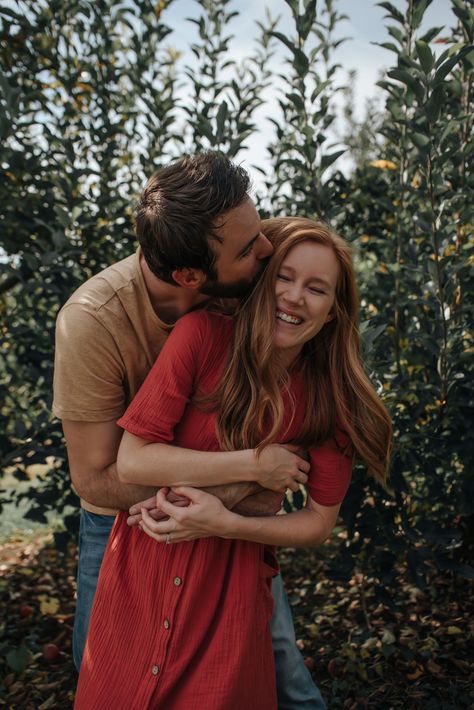 Couple Poses Apple Orchard, Apple Orchard Engagement Photos Fall, Fall Couple Pictures Apple Orchard, Apple Picking Poses Couple, Apple Orchard Proposal, Fall Apple Orchard Photo Shoot, Engagement Photos Apple Orchard, Apple Orchard Couples Photoshoot, Apple Picking Photoshoot Family Photos