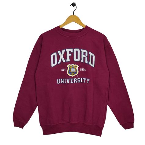 Excited to share the latest addition to my #etsy shop: University Of Oxford Crewneck Sweatshirt Medium Vintage Oxford University Embroidery Sweater Jumper Pullover Maroon Size M #oxforduniversity https://etsy.me/3lw8ySY Oxford University Jumper, Oxford University Sweater, Oxford University Uniform, Oxford University Hoodie, Oxford Sweater, Uni Clothes, Gym Uniform, University Sweater, College Sweater