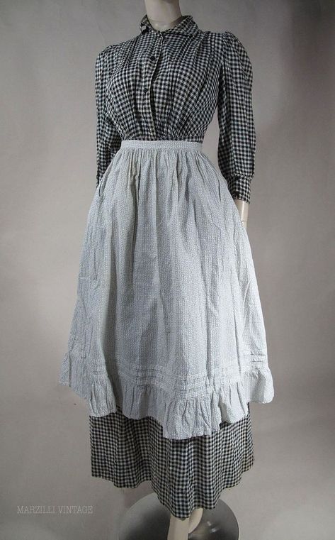 1890 aprons | 1890's Black & White Gingham Day Dress With Calico Apron 1800 Poor Clothing, 1900s American Fashion, 1890s Fashion Women Day Dresses, 1900s Fashion Poor, Victorian Poor Clothes, 1890s Fashion Women Casual, 1840s Fashion Poor, 1890s Fashion Poor, 1890s Dress Poor