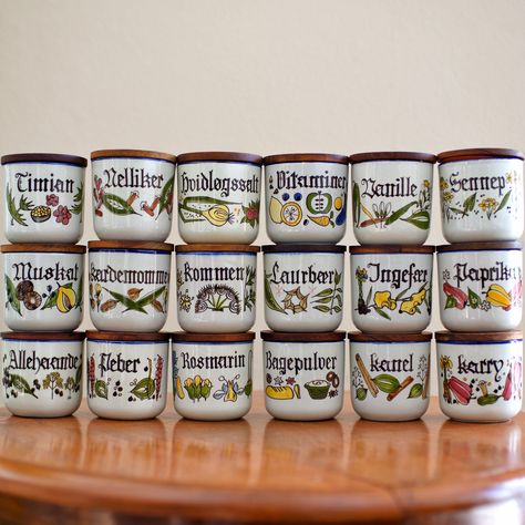 Here we have various spice jars from Knabstrup ceramic with a teak lid. This series is called Pernille. Each jar has a different handpainted look that reflects the spice. There is a teak lid with a rubber seal.  They look very nice on the kitchen shelf and you can also just use The jars as decor. The Pernille series was in production from 1962- 1982 at Kanapstup Ceramics in Denmark. NOTICE - The Prices is for one jar each!  Is is not for the set in the picture. Choose a jar/spice in the Pattern Spice Drawer, Spice Rack Organiser, Spice Racks, Spice Box, Spice Jar, Kitchen Shelf, Vintage Illustrations, Ceramics Pottery, Spice Rack