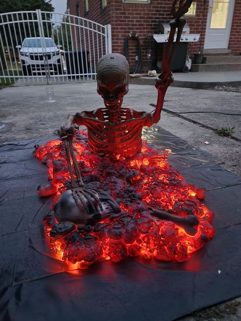 HALLOWEEN GRAVEYARDS, DISPLAYS AND HAUNTS | I have seen some skeleton displays where they they are just a torso coming out of what looks like a fire ground (foam spray with lights) Spray Foam Halloween Decorations Diy, Spray Foam Skeleton, Skeleton Coming Out Of Ground, Halloween Graveyard Lighting, Skeleton Campfire Halloween, Biohazard Halloween Decorations, Skeleton Ideas For Yard, Spray Foam Halloween Decorations, Diy Skeleton Decor