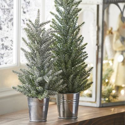 NATURE SINGS Snow-dusted pines and natural forest elements evoke the spirit of Christmas and our NATURE SINGS collection captures this spirit. Give your display a rustic look and a bit of sparkle with our Metal and Rattan Lighted Cone Trees. Bring a hint of color with our Decorative Mixed Greenery Wreath. Arrange our Bundle of 3 Birch Logs next to your fireplace. Our Aged Hanging Metal Bells are perfect for the holidays. Our Braided Pom Tassel Throw Blanket makes a perfect gift. Forest Christmas Decor, Winter Tray Decor, Farmhouse Tree, Faux Trees, Black Farmhouse, Cone Trees, Countertop Display, Tabletop Christmas Tree, Faux Tree