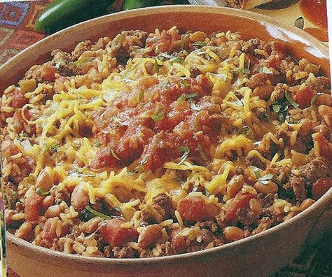 A hearty meal in a skillet with beef, onions, garlic pinto beans, tomatoes, green chiles, cheddar cheese and rice. Enjoy! Texas Skillet, Cheese And Rice, Pinto Bean Recipes, Hotdish Recipes, Recipes Cheese, Contest Ideas, Foods Ideas, Cheese Cheddar, Green Chiles