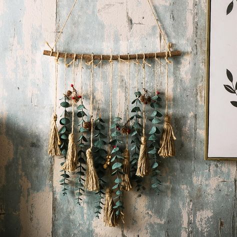 PRICES MAY VARY. Elegant Simple Boho Wall Decor - Our hanging eucalyptus wall decor stands out with its unique design, featuring pinecone, and tassels to create a natural, earthy, and peaceful bohemian vibe. The design adds a touch of rustic elegance to any room, making it a standout piece in your home or office decor. Premium Quality and Detailed Measurements - The artificial eucalyptus greenery hanging wall decor features a natural solid wood rod with a length of 15.74 to 16.5 inches and a dia Plant Wall Hangers Indoor, Bohemian Wall Art Bedroom, Woodland Office Decor, Small Tapestry Wall Hangings, Farmhouse Door Decor, Wooden Hanging Decor, Southern Boho Decor, Art With Nature Materials, Apothecary Kitchen Decor