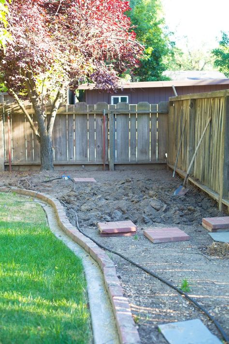 A before image of a backyard with grass and dirt patch Before And After Backyard Landscaping, Backyard Easement Landscaping Ideas, Front Yard Oasis Ideas, Simple Yard Ideas Easy Diy, Transform Backyard On A Budget, Backyard Easy Landscaping Ideas, Backyard Remodel Before And After, Cover Dirt Backyard Ideas, Medium Backyard Ideas