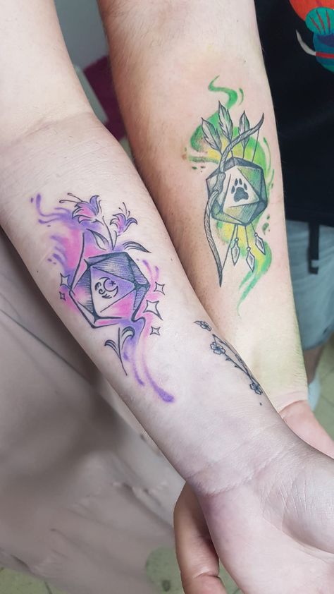 D&D inspired tattoos Dnd Couple Tattoos, D20 Tattoo Design, Gaming Tatoos Ideas, Dnd Matching Tattoos, Dnd Dice Tattoo Design, Dnd Tattoo Sleeve, D 20 Tattoo, Dnd Inspired Tattoos, Dnd Tatoos Ideas