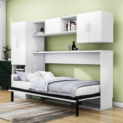 The murphy bed can be folded away into a cabinet, opening up valuable floor space. With its modern and decorative moldings, it complements any decor style. The built-in storage space, including open shelves, lockers with doors, and large drawers, allows you to organize books, clothing, and personal items. Enhance your productivity and leisure time with the built-in desk feature. The sturdy construction of the bed frame, made of MDF and metal with reinforced support legs, ensures a durable struct Twin Size Murphy Bed, Desk Wardrobe, Murphy Bed Desk, Bed Shelves, Cabinets Drawers, Wardrobe Drawers, Bed Desk, Built In Desk, Leisure Time