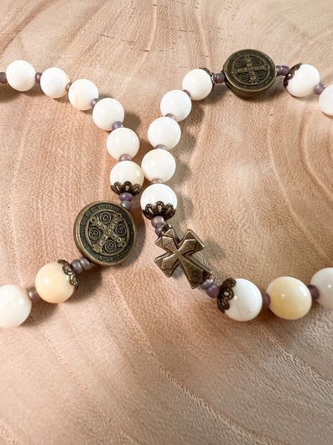 Elevate your spiritual journey with our new St. Benedict rosary stretch bracelet. Crafted with carefully selected beads, this singlet bracelet features traditional rosary elements that serve as a simple reminder to pause and pray. Catholic Bracelet, St Benedict, Catholic Rosary, Simple Reminders, Catholic Jewelry, Saints Medals, Heart Of Jesus, Rosary Catholic, Miraculous Medal