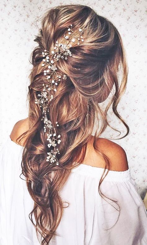 Planning on wearing a wedding dress with an open back or something with a back detail? Opt for a classic up-do hairstyle to show-off your beautiful wedding day look.   18 Most Romantic Bridal Updos And Wedding Hairstyles  ❤ See more: http://www.weddingforward.com/romantic-bridal-updos-wedding-hairstyles/ Romantic Bridal Updos, Hairstyles Bride, Boho Bridal Hair, Kadeřnické Trendy, Flowers In Her Hair, Bridal Hairstyles, Bridal Updo, Boho Bridal, Wedding Hair And Makeup