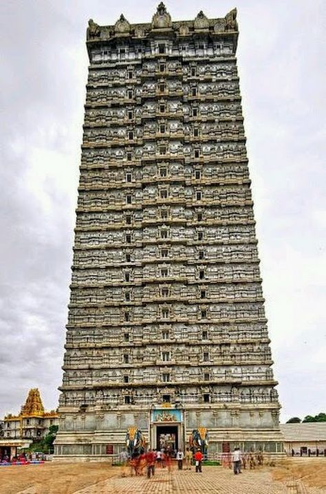 Murudeshwar Temple,India.Located in Karnataka, this magnificent shrine is dedicated to Lord Shiva. This temple boasts of the second highest statue of Lord Shiva in the world.his temple is built on the Kanduka Hill which is surrounded by the Arabian Sea on three sides. The main temple's entrance, also called the 'gopura' stands at 123 feet and you can witness the breathtaking view of the Shiva statue from the top of the gopura. India Travel Places, Temple India, Sacred Groves, Indian Temple Architecture, India Architecture, Ancient Indian Architecture, Temple Photography, Amazing India, Temple Architecture