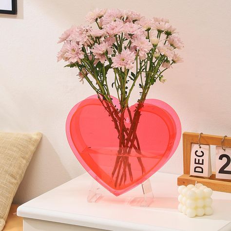 PRICES MAY VARY. ❤️HEART VASE: PORPAN Heart Vase is perfect for displaying your flower bouquets and adding a touch of elegance and simplicity to your living room, dining room, entryway, mantle, shelf, coffee table, fireplace, and porch. 💛HANGABLE WALL VASE: This heart-shaped vase has a hole in the back, which can be used to be hung up on the wall. This acrylic heart vase will fit on walls like bedrooms, entryways, mantles, offices, cafes, restaurants, and dining rooms. 💙FLOWER SELECTION: With Aesthetic Vase, Acrylic Flower Vase, Funky Vases, Heart Shaped Vase, College Room Decor, Long Stem Flowers, Acrylic Vase, Heart Vase, Bedroom Table