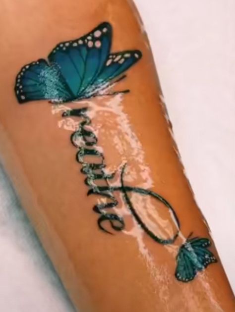 Blue Ink Tattoos Black Women, Teal Butterfly Tattoo, Ambre Nails, Blue Ink Tattoos, Blue Butterfly Tattoo, Teal Butterfly, Cross Tattoo Designs, Blue Tattoo, Dope Tattoos For Women